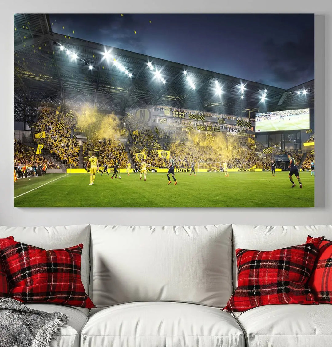 The Columbus Crew Stadium Match Triple Canvas Wall Art, featuring a dynamic MLS game scene, captures the excitement of a thrilling soccer match with stadium lights illuminating the field and crowd.