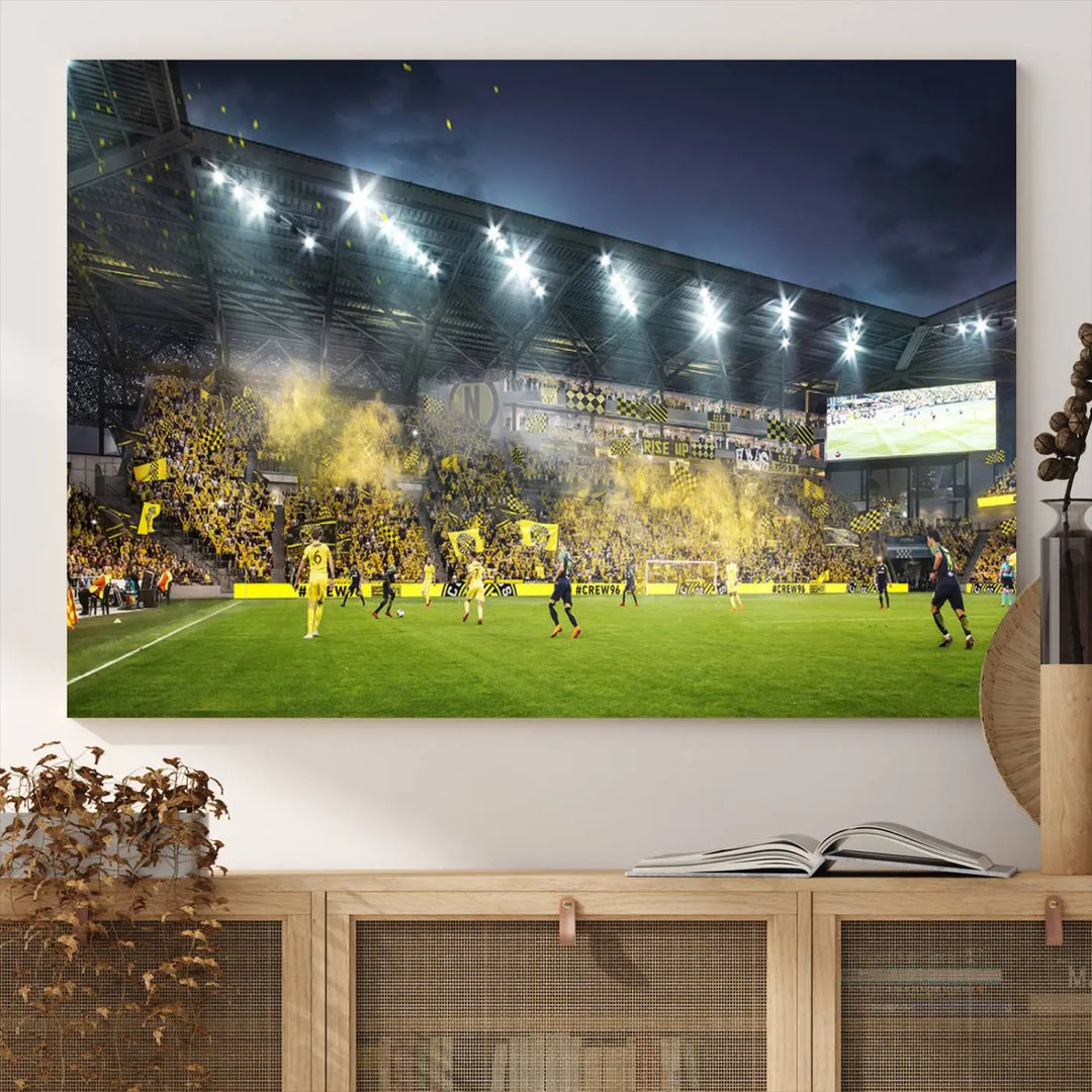 The Columbus Crew Stadium Match Triple Canvas Wall Art, featuring a dynamic MLS game scene, captures the excitement of a thrilling soccer match with stadium lights illuminating the field and crowd.