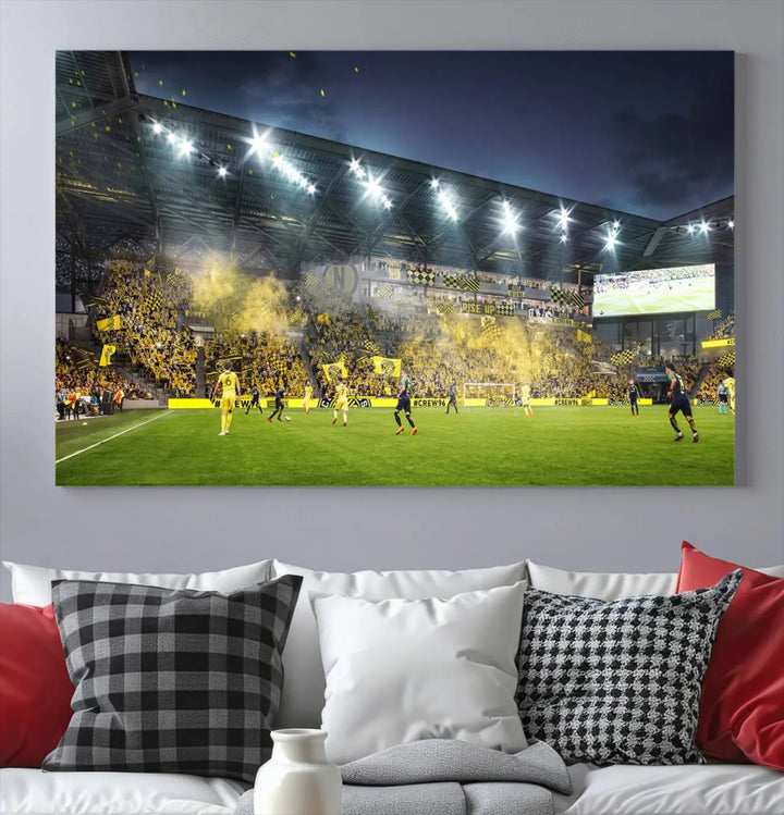 The Columbus Crew Stadium Match Triple Canvas Wall Art, featuring a dynamic MLS game scene, captures the excitement of a thrilling soccer match with stadium lights illuminating the field and crowd.