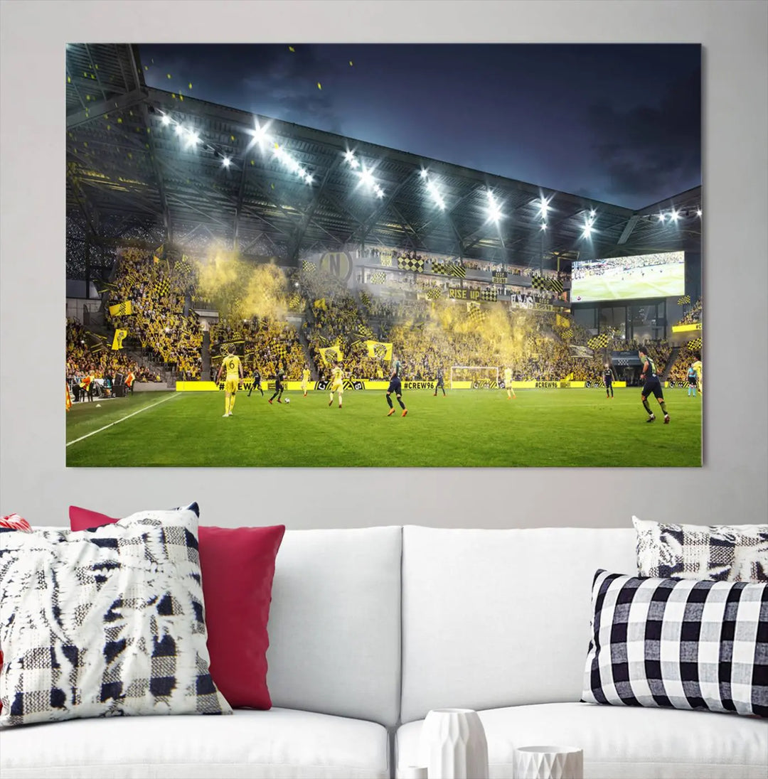 The Columbus Crew Stadium Match Triple Canvas Wall Art, featuring a dynamic MLS game scene, captures the excitement of a thrilling soccer match with stadium lights illuminating the field and crowd.