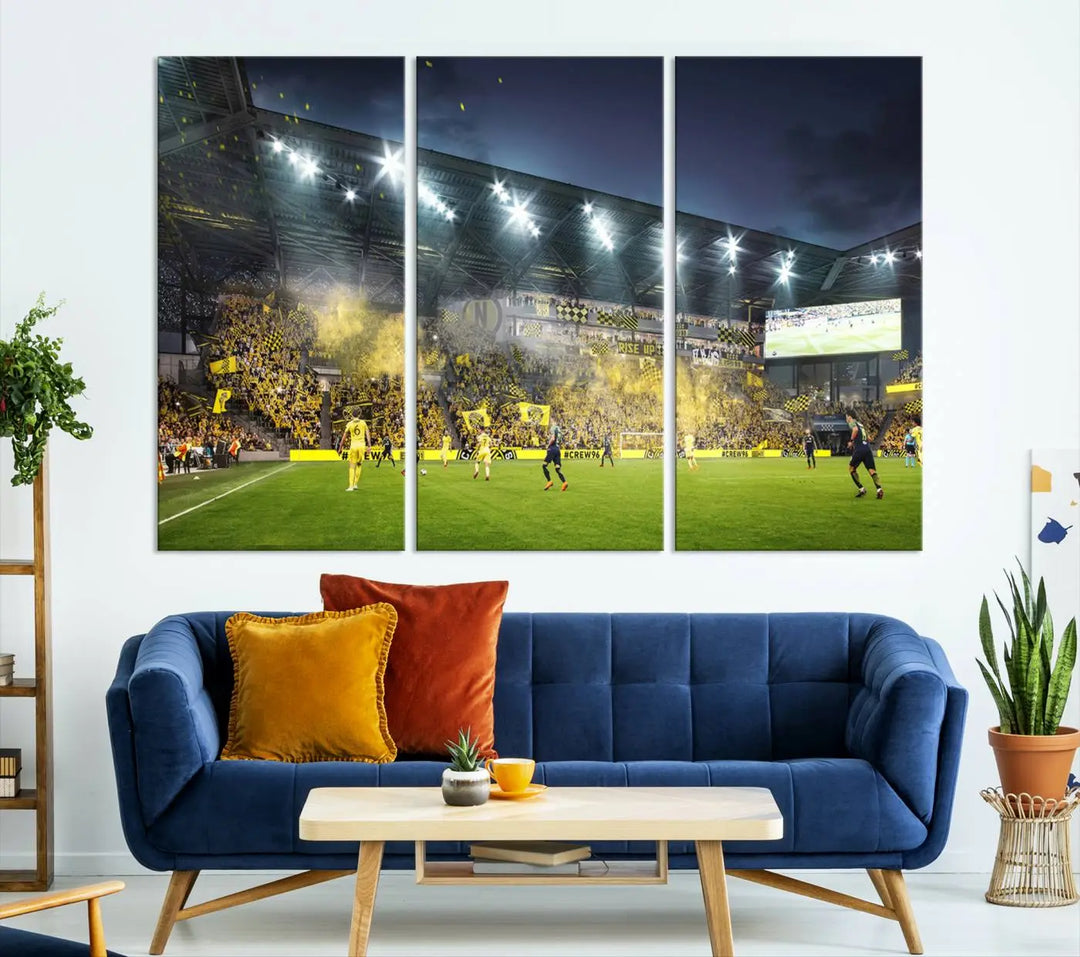 The Columbus Crew Stadium Match Triple Canvas Wall Art, featuring a dynamic MLS game scene, captures the excitement of a thrilling soccer match with stadium lights illuminating the field and crowd.