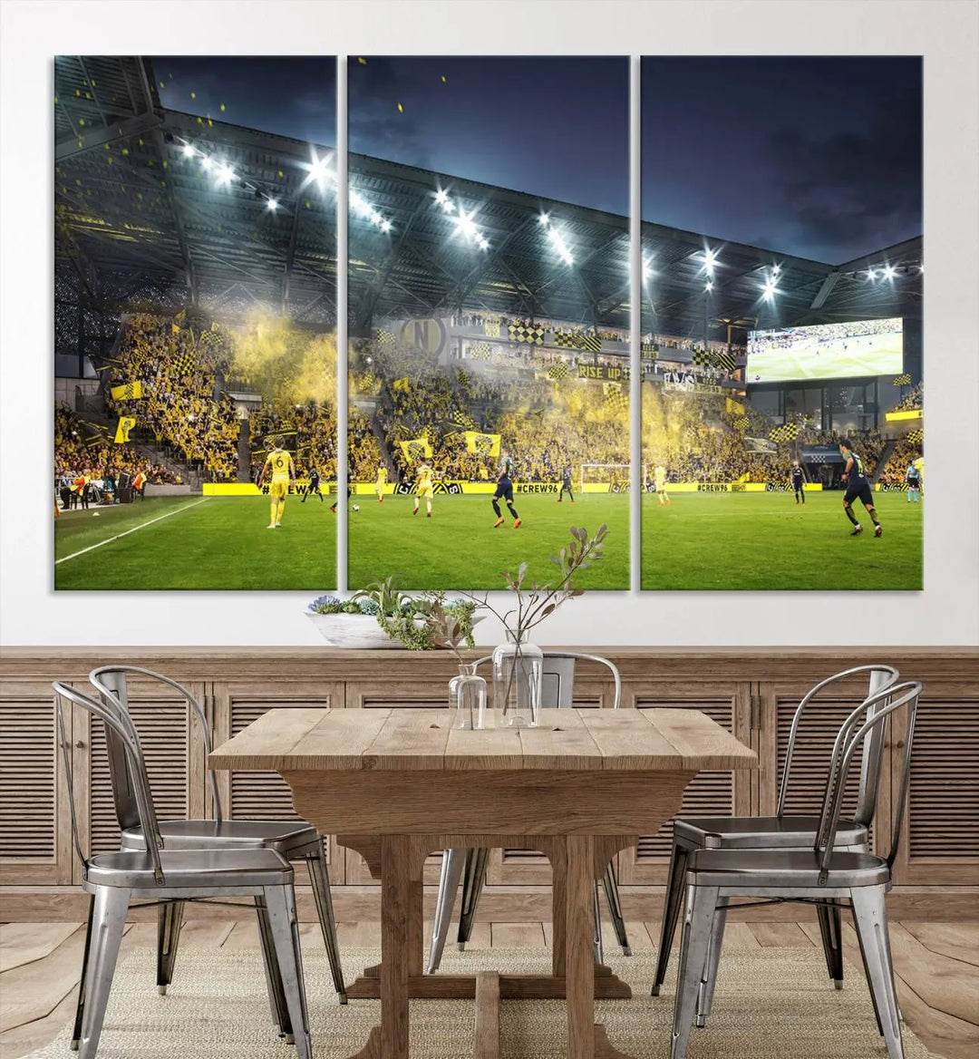 The Columbus Crew Stadium Match Triple Canvas Wall Art, featuring a dynamic MLS game scene, captures the excitement of a thrilling soccer match with stadium lights illuminating the field and crowd.