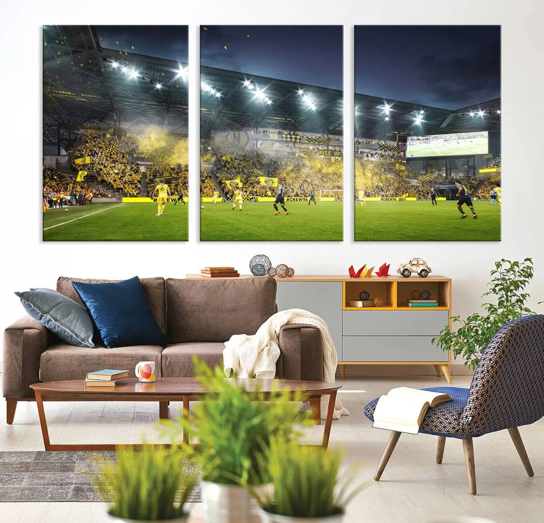 The Columbus Crew Stadium Match Triple Canvas Wall Art, featuring a dynamic MLS game scene, captures the excitement of a thrilling soccer match with stadium lights illuminating the field and crowd.