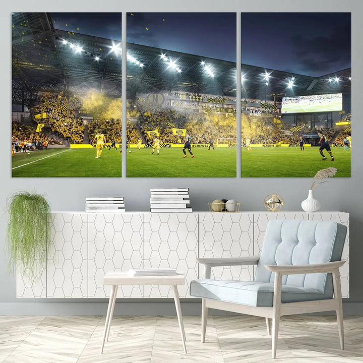 The Columbus Crew Stadium Match Triple Canvas Wall Art, featuring a dynamic MLS game scene, captures the excitement of a thrilling soccer match with stadium lights illuminating the field and crowd.