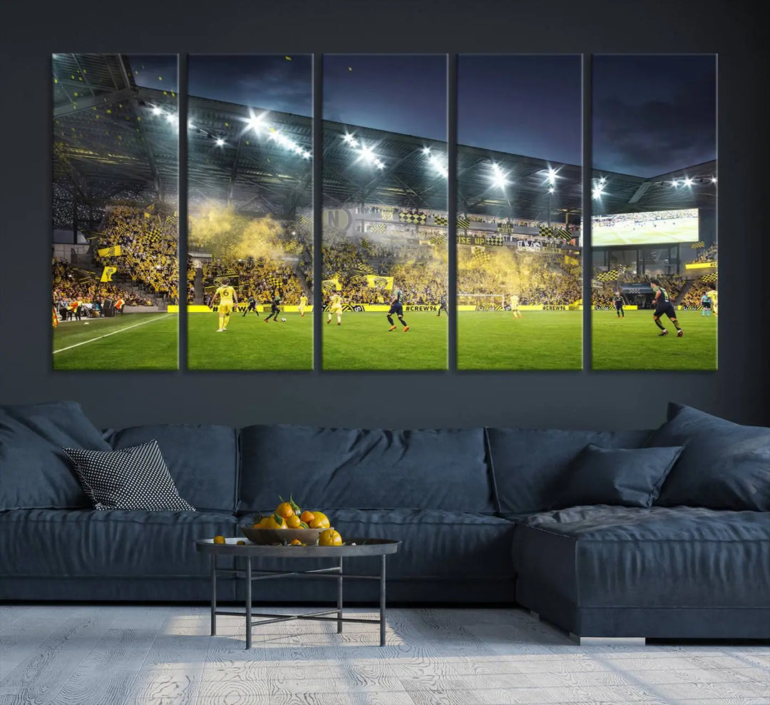 The Columbus Crew Stadium Match Triple Canvas Wall Art, featuring a dynamic MLS game scene, captures the excitement of a thrilling soccer match with stadium lights illuminating the field and crowd.