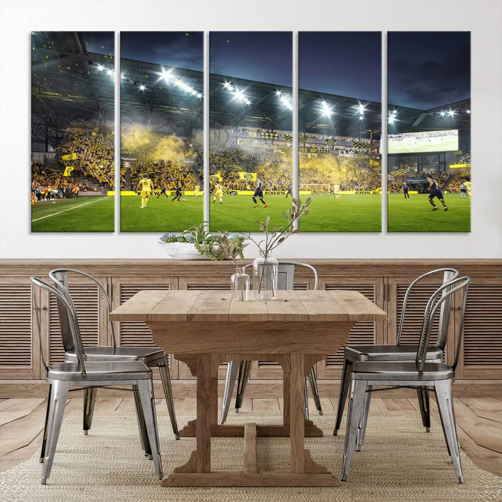 The Columbus Crew Stadium Match Triple Canvas Wall Art, featuring a dynamic MLS game scene, captures the excitement of a thrilling soccer match with stadium lights illuminating the field and crowd.