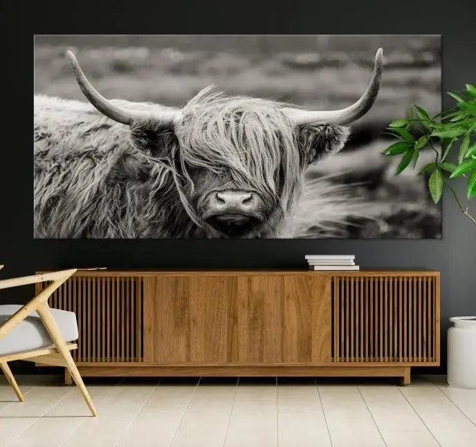 The "Cow Focus Art Wall Art Canvas Print" is a striking triptych depicting a Highland cow, presented on museum-quality canvases. It includes a UV-protective coating to ensure long-lasting vibrancy.