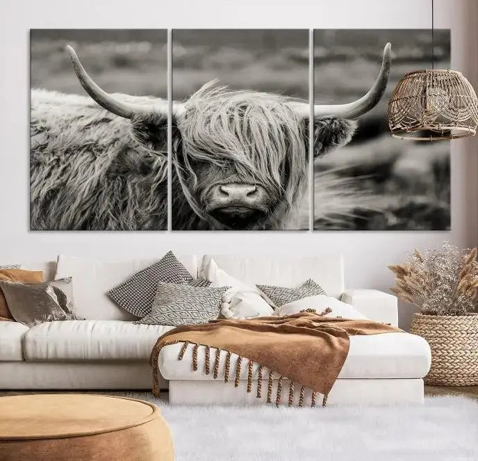 The "Cow Focus Art Wall Art Canvas Print" is a striking triptych depicting a Highland cow, presented on museum-quality canvases. It includes a UV-protective coating to ensure long-lasting vibrancy.