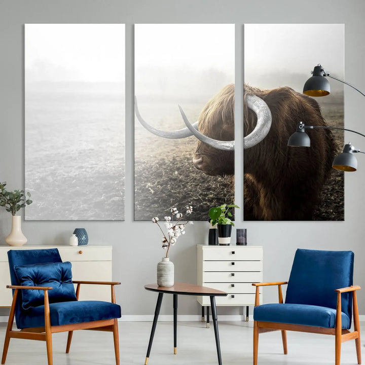 A captivating Cow Wall Art Canvas Print featuring a Highland cow with impressive horns in a misty field, crafted on museum-quality canvas. Its UV-protective coating preserves the artwork's vibrant colors.