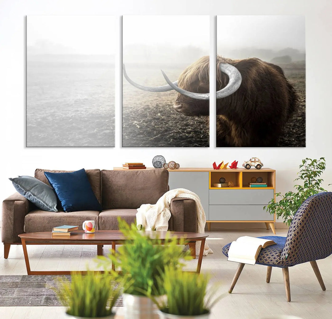 A captivating Cow Wall Art Canvas Print featuring a Highland cow with impressive horns in a misty field, crafted on museum-quality canvas. Its UV-protective coating preserves the artwork's vibrant colors.