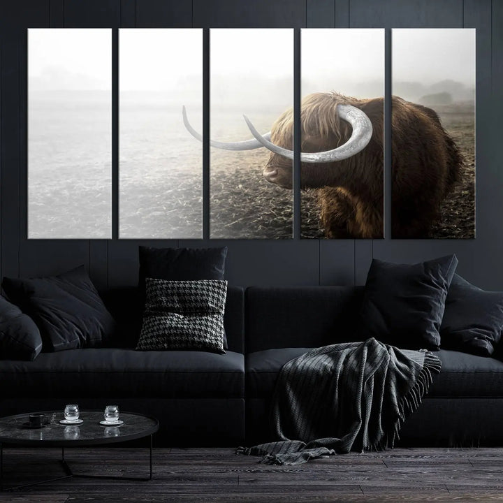 A captivating Cow Wall Art Canvas Print featuring a Highland cow with impressive horns in a misty field, crafted on museum-quality canvas. Its UV-protective coating preserves the artwork's vibrant colors.