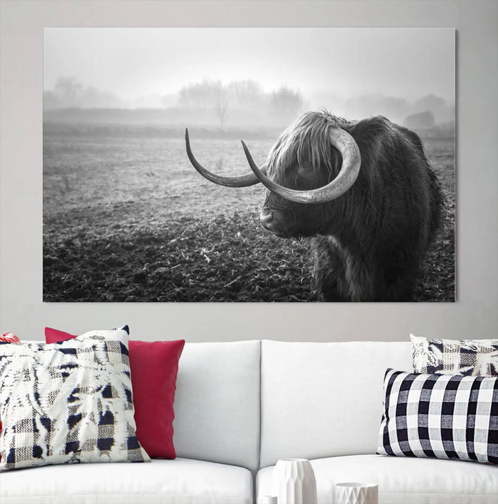 The living room features a three-panel wall art of a highland cow in a foggy field, using the Cow Wall Art Canvas Print for visual impact. This museum-quality canvas includes UV-protective coating to ensure longevity.