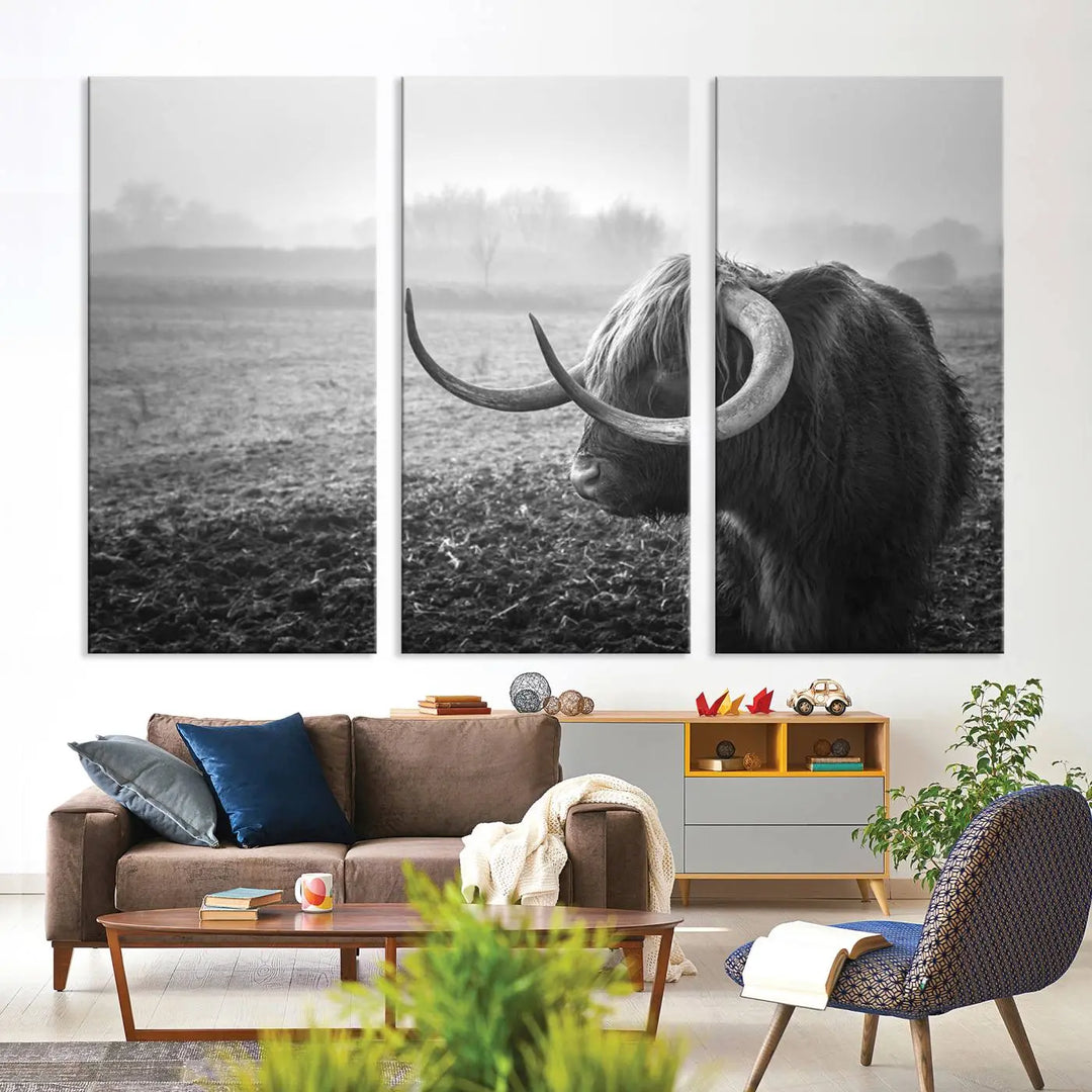 The living room features a three-panel wall art of a highland cow in a foggy field, using the Cow Wall Art Canvas Print for visual impact. This museum-quality canvas includes UV-protective coating to ensure longevity.