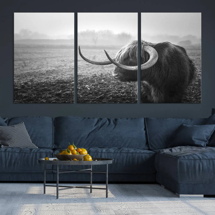 The living room features a three-panel wall art of a highland cow in a foggy field, using the Cow Wall Art Canvas Print for visual impact. This museum-quality canvas includes UV-protective coating to ensure longevity.