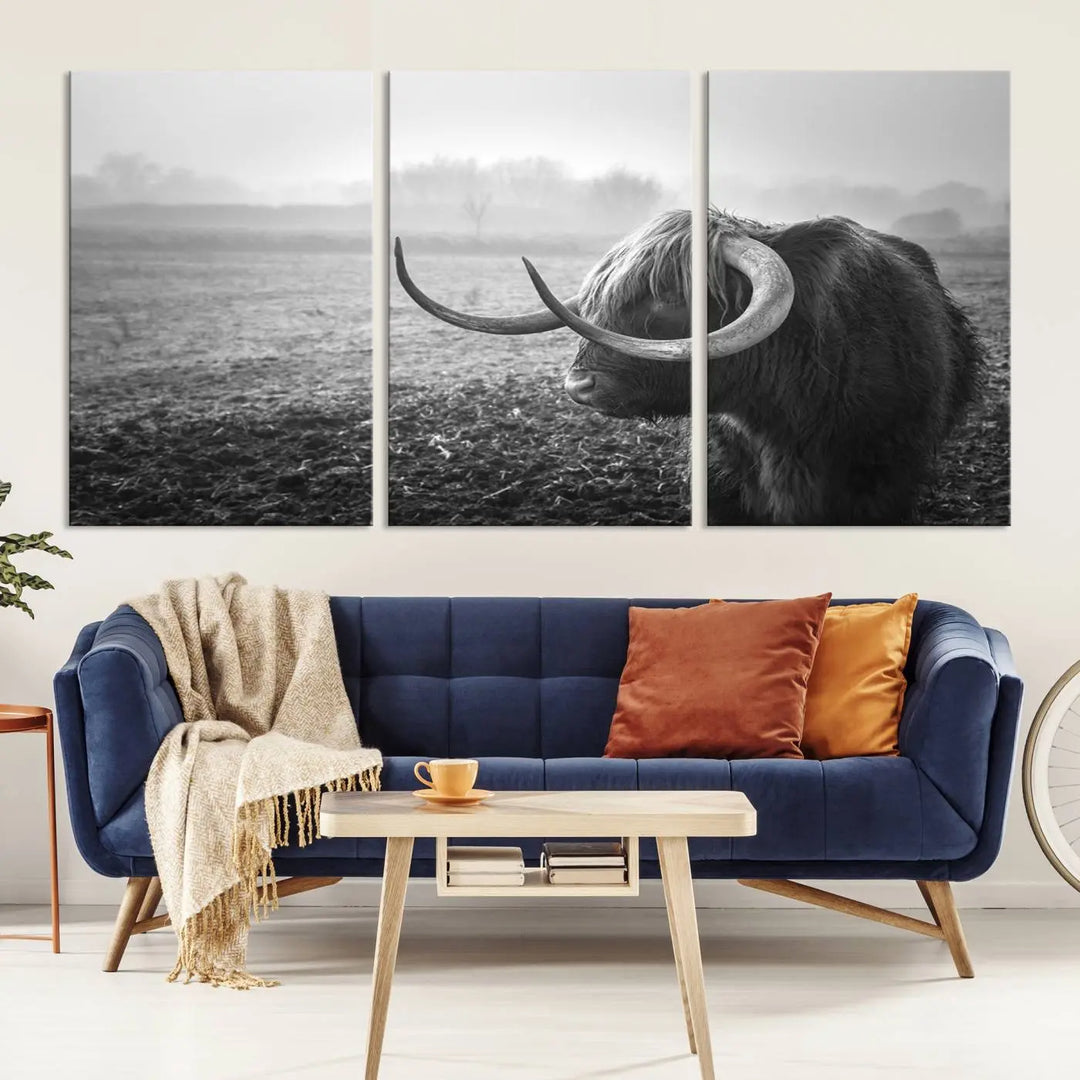 The living room features a three-panel wall art of a highland cow in a foggy field, using the Cow Wall Art Canvas Print for visual impact. This museum-quality canvas includes UV-protective coating to ensure longevity.