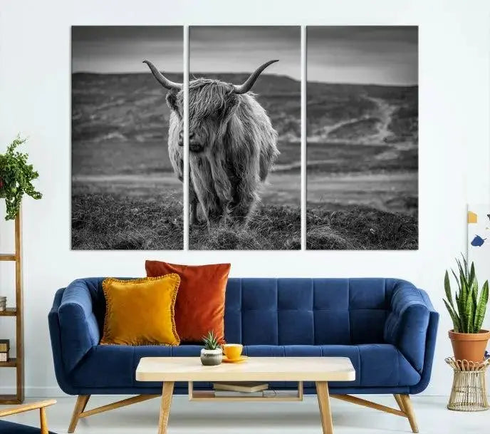 Cow Wall Art Canvas Print featuring a Highland cow in a black and white landscape on museum-quality canvas. A UV-protective coating preserves its pristine condition for years to come.