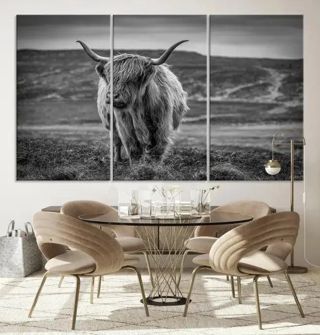 Cow Wall Art Canvas Print featuring a Highland cow in a black and white landscape on museum-quality canvas. A UV-protective coating preserves its pristine condition for years to come.