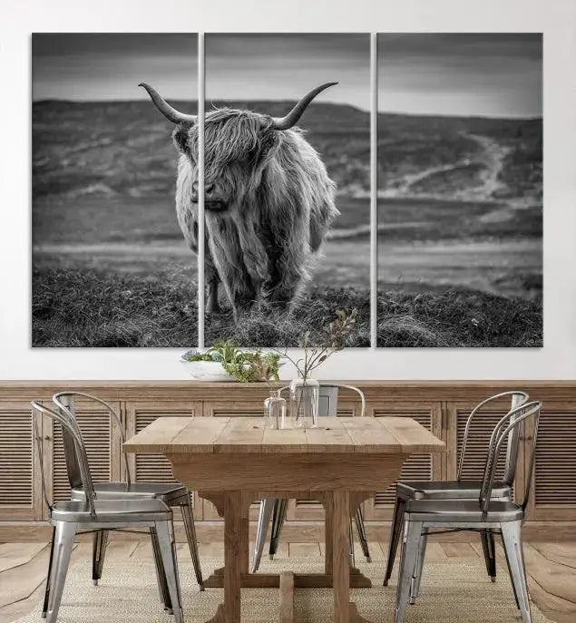 Cow Wall Art Canvas Print featuring a Highland cow in a black and white landscape on museum-quality canvas. A UV-protective coating preserves its pristine condition for years to come.