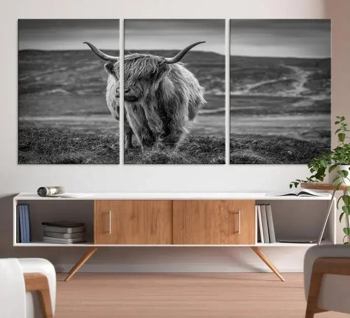 Cow Wall Art Canvas Print featuring a Highland cow in a black and white landscape on museum-quality canvas. A UV-protective coating preserves its pristine condition for years to come.