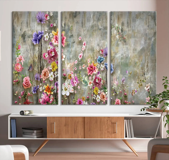 The Cozy Flowers Painting on Canvas Wall Art Floral Canvas Print is a three-panel floral masterpiece crafted on museum-quality canvas. It displays vibrant flowers set against a textured backdrop, ready to hang and protected by a UV-coating to ensure lasting vibrancy.