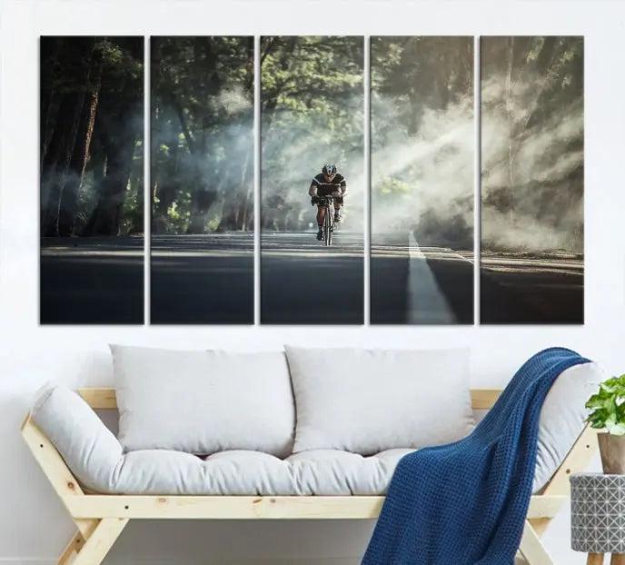 A cyclist rides through a misty forest in the "Cycling Road Bike in the Morning" artwork, divided into three panels on gallery-wrapped, museum-quality canvas.