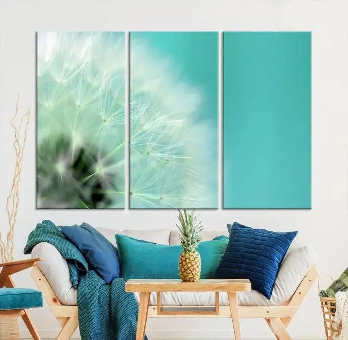 The room is elegantly enhanced by the DANDELION Flower Wall Art Canvas Print, showcasing a close-up of a dandelion in a triptych format. Printed on museum-quality canvas with UV-protective coating, this piece adds sophistication to any modern living room. Enjoy the added convenience of free shipping.