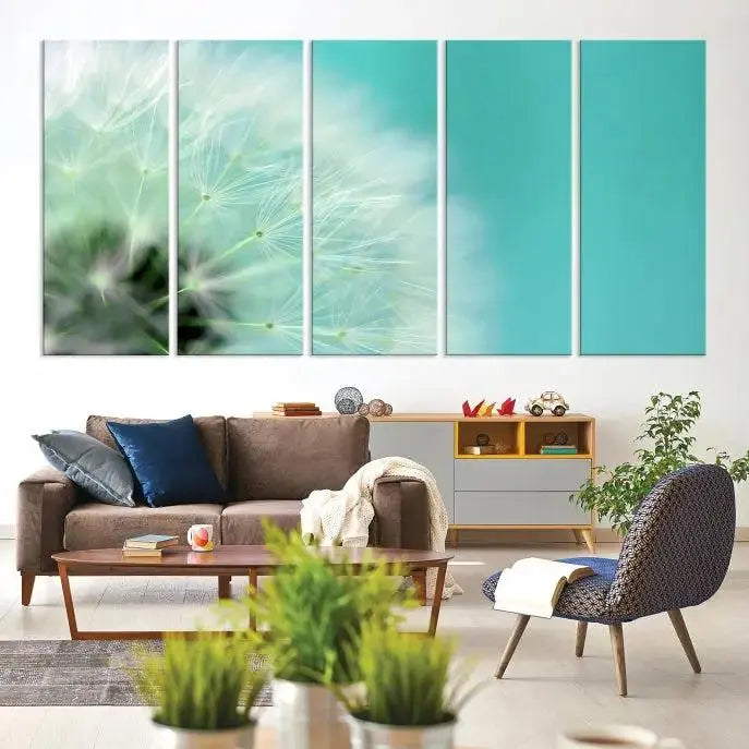 The room is elegantly enhanced by the DANDELION Flower Wall Art Canvas Print, showcasing a close-up of a dandelion in a triptych format. Printed on museum-quality canvas with UV-protective coating, this piece adds sophistication to any modern living room. Enjoy the added convenience of free shipping.