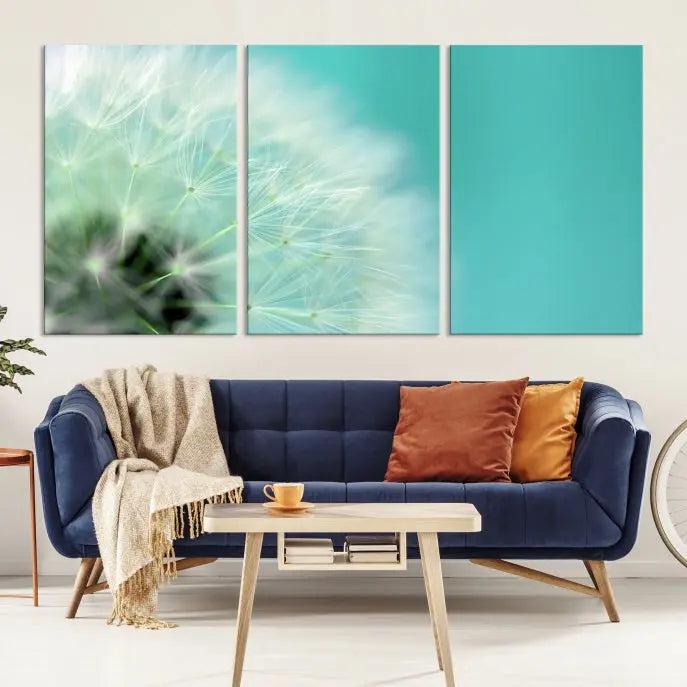 The room is elegantly enhanced by the DANDELION Flower Wall Art Canvas Print, showcasing a close-up of a dandelion in a triptych format. Printed on museum-quality canvas with UV-protective coating, this piece adds sophistication to any modern living room. Enjoy the added convenience of free shipping.