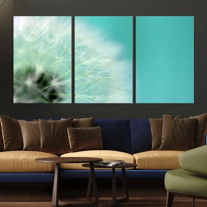 The room is elegantly enhanced by the DANDELION Flower Wall Art Canvas Print, showcasing a close-up of a dandelion in a triptych format. Printed on museum-quality canvas with UV-protective coating, this piece adds sophistication to any modern living room. Enjoy the added convenience of free shipping.