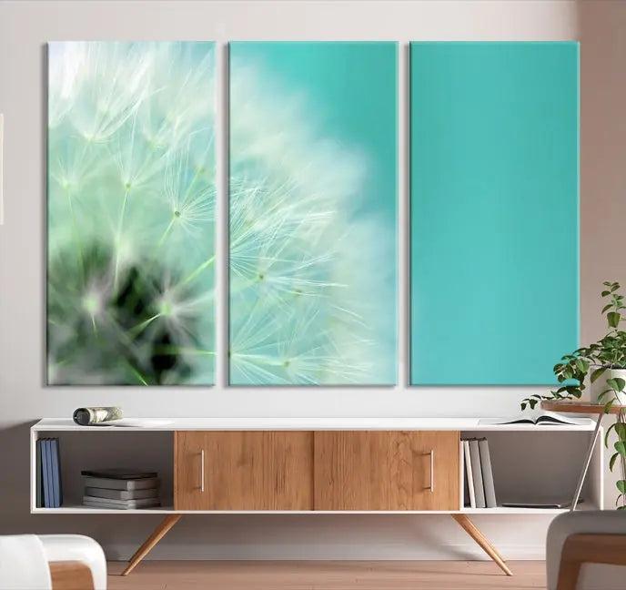 The room is elegantly enhanced by the DANDELION Flower Wall Art Canvas Print, showcasing a close-up of a dandelion in a triptych format. Printed on museum-quality canvas with UV-protective coating, this piece adds sophistication to any modern living room. Enjoy the added convenience of free shipping.