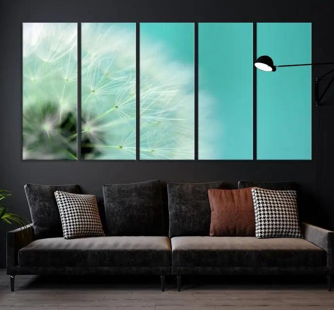 The room is elegantly enhanced by the DANDELION Flower Wall Art Canvas Print, showcasing a close-up of a dandelion in a triptych format. Printed on museum-quality canvas with UV-protective coating, this piece adds sophistication to any modern living room. Enjoy the added convenience of free shipping.