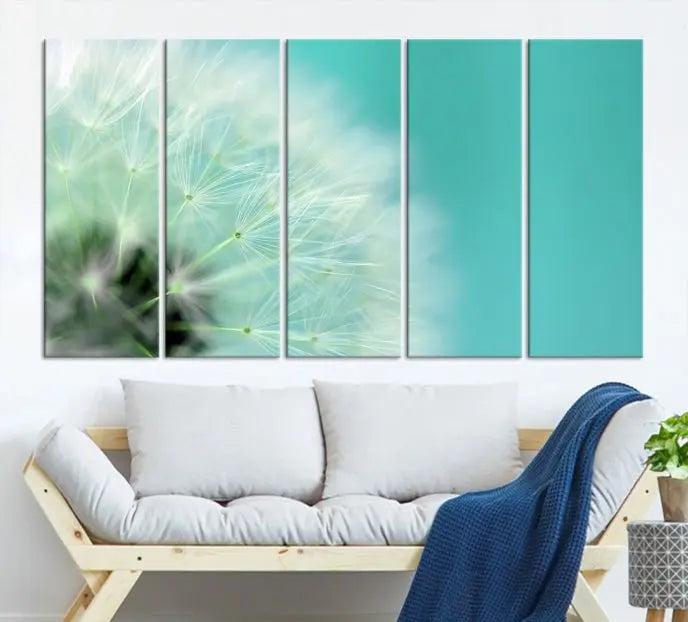 The room is elegantly enhanced by the DANDELION Flower Wall Art Canvas Print, showcasing a close-up of a dandelion in a triptych format. Printed on museum-quality canvas with UV-protective coating, this piece adds sophistication to any modern living room. Enjoy the added convenience of free shipping.