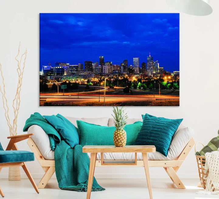 An inviting room features the "Dallas City Lights Night Bright Blue Skyline Cityscape View Wall Art Canvas Print," elegantly suspended and basking in soft lighting.