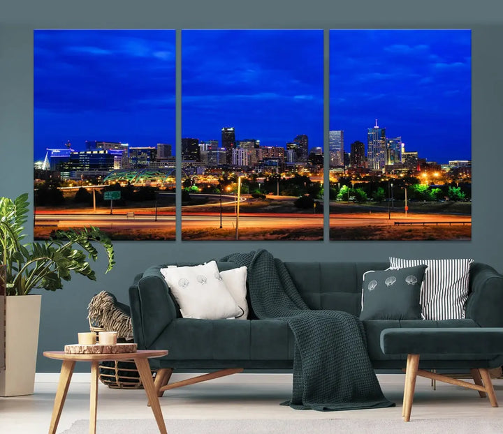 An inviting room features the "Dallas City Lights Night Bright Blue Skyline Cityscape View Wall Art Canvas Print," elegantly suspended and basking in soft lighting.