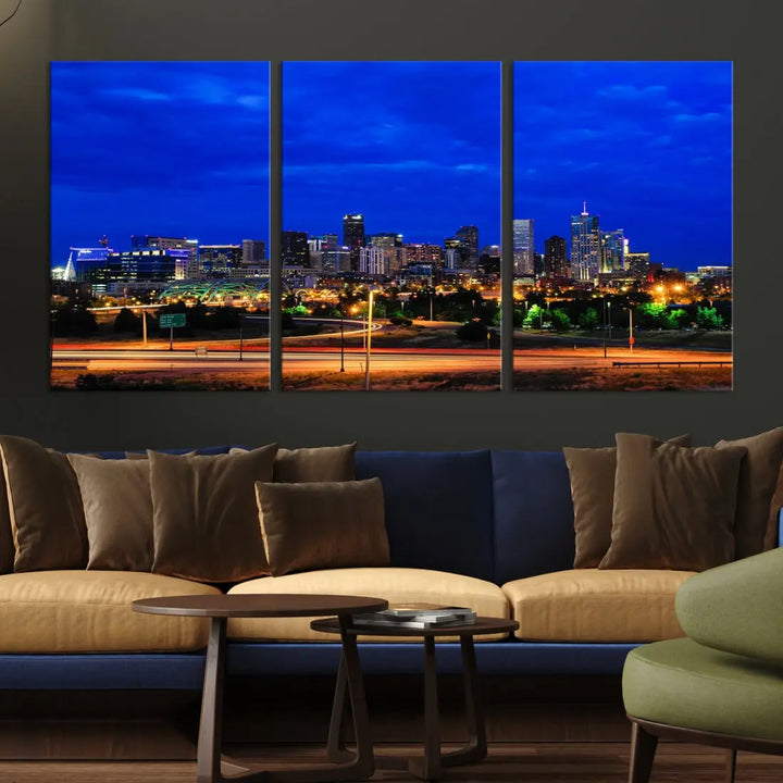 An inviting room features the "Dallas City Lights Night Bright Blue Skyline Cityscape View Wall Art Canvas Print," elegantly suspended and basking in soft lighting.