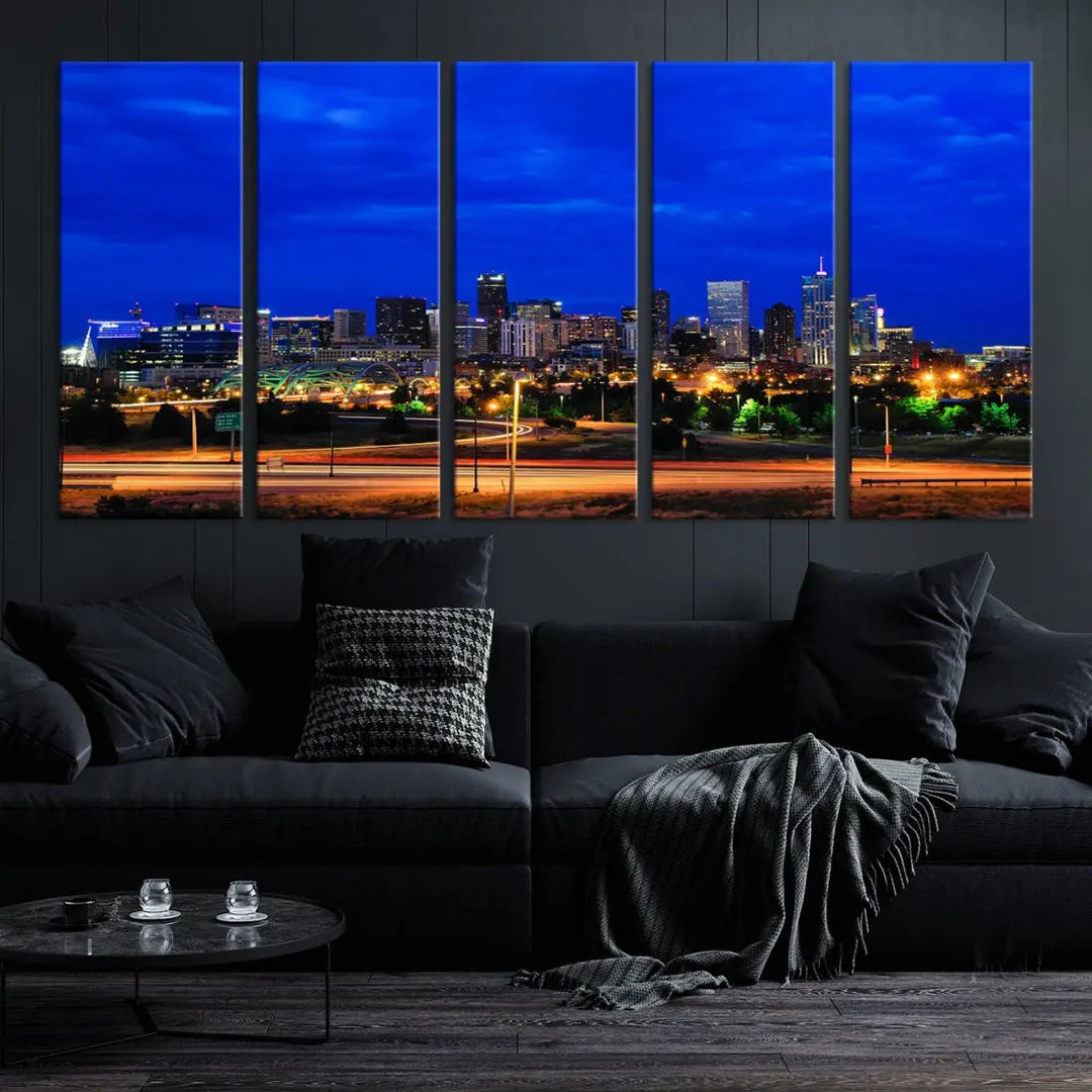 An inviting room features the "Dallas City Lights Night Bright Blue Skyline Cityscape View Wall Art Canvas Print," elegantly suspended and basking in soft lighting.