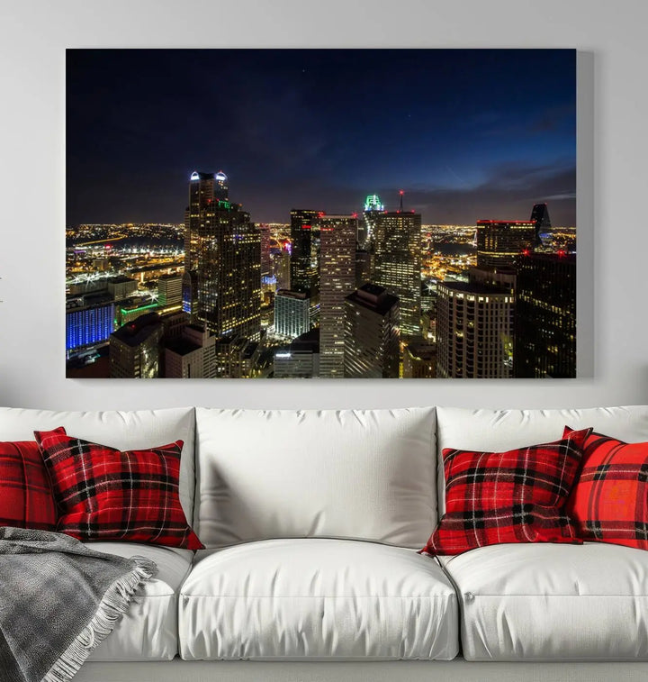 A living room showcasing a Dallas City Lights Night Skyline Cityscape View Wall Art Canvas Print, a three-panel artwork on museum-quality canvas with vibrant colors and durability.