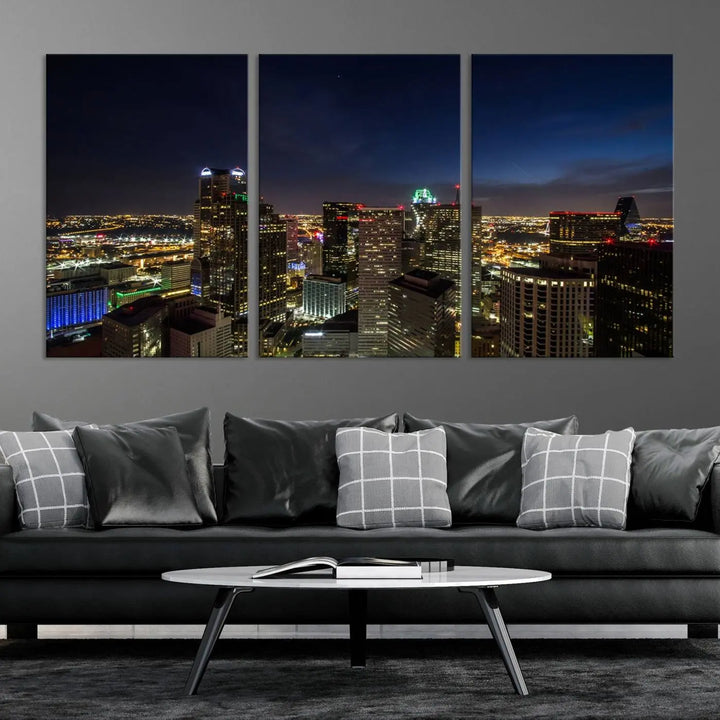 A living room showcasing a Dallas City Lights Night Skyline Cityscape View Wall Art Canvas Print, a three-panel artwork on museum-quality canvas with vibrant colors and durability.