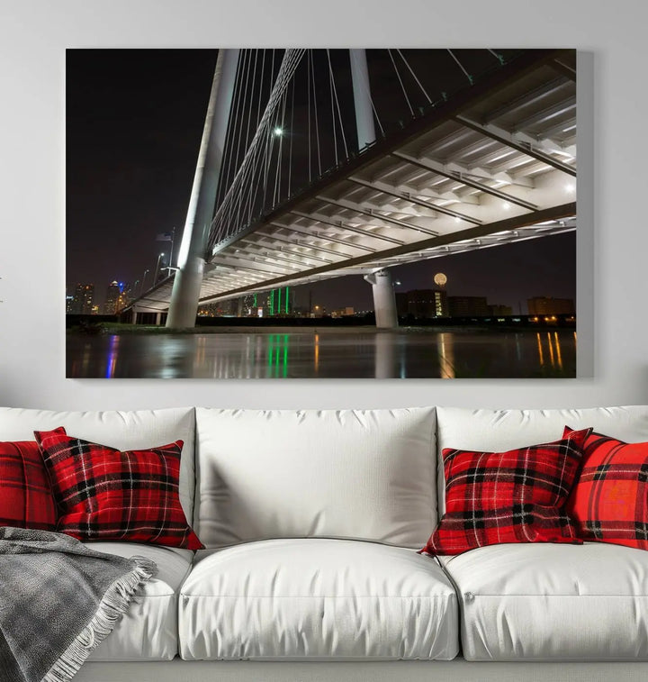 A modern living room showcases the "Dallas City Lights" night skyline cityscape as a triptych on museum-quality canvas. Enjoy the art's longevity with its UV-protective coating, all available with free shipping.