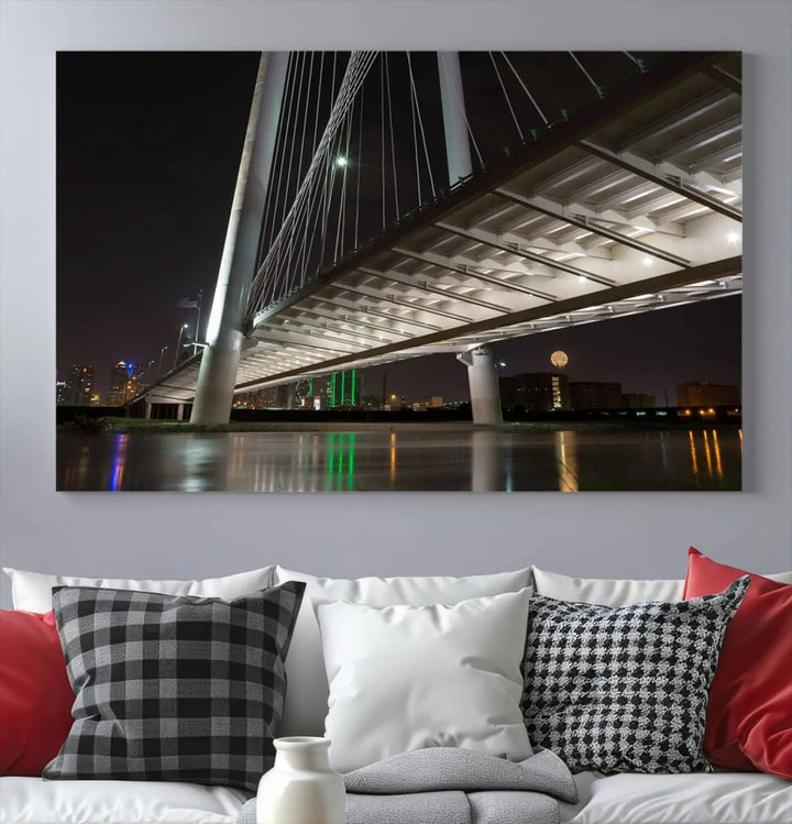 A modern living room showcases the "Dallas City Lights" night skyline cityscape as a triptych on museum-quality canvas. Enjoy the art's longevity with its UV-protective coating, all available with free shipping.