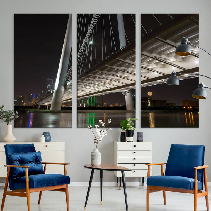 A modern living room showcases the "Dallas City Lights" night skyline cityscape as a triptych on museum-quality canvas. Enjoy the art's longevity with its UV-protective coating, all available with free shipping.