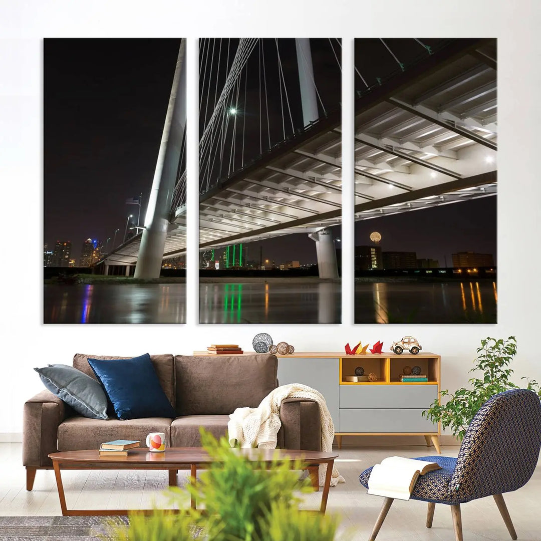 A modern living room showcases the "Dallas City Lights" night skyline cityscape as a triptych on museum-quality canvas. Enjoy the art's longevity with its UV-protective coating, all available with free shipping.