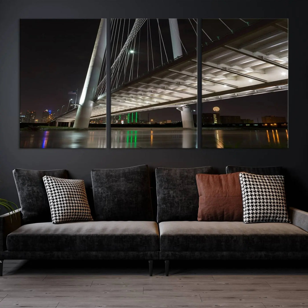 A modern living room showcases the "Dallas City Lights" night skyline cityscape as a triptych on museum-quality canvas. Enjoy the art's longevity with its UV-protective coating, all available with free shipping.