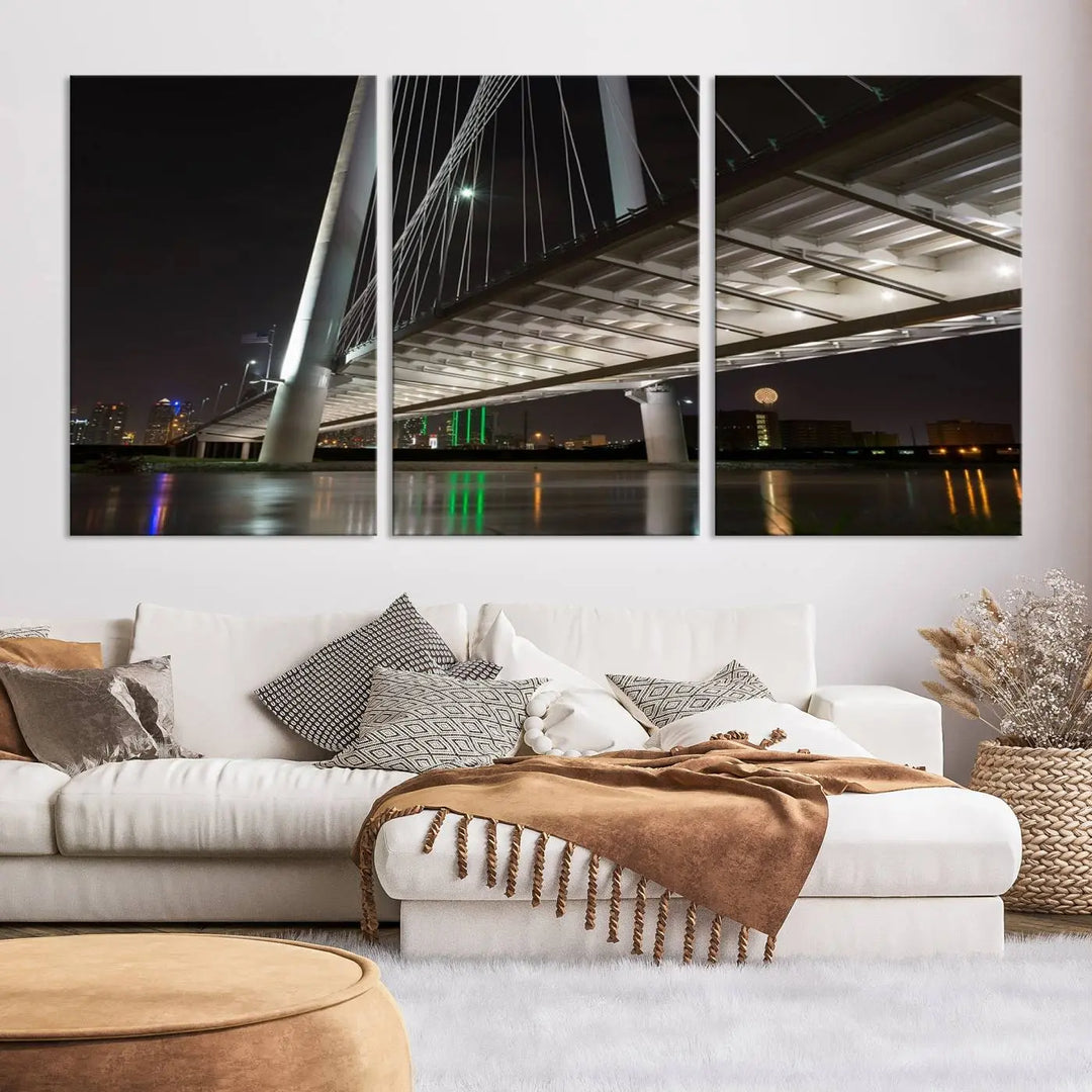 A modern living room showcases the "Dallas City Lights" night skyline cityscape as a triptych on museum-quality canvas. Enjoy the art's longevity with its UV-protective coating, all available with free shipping.