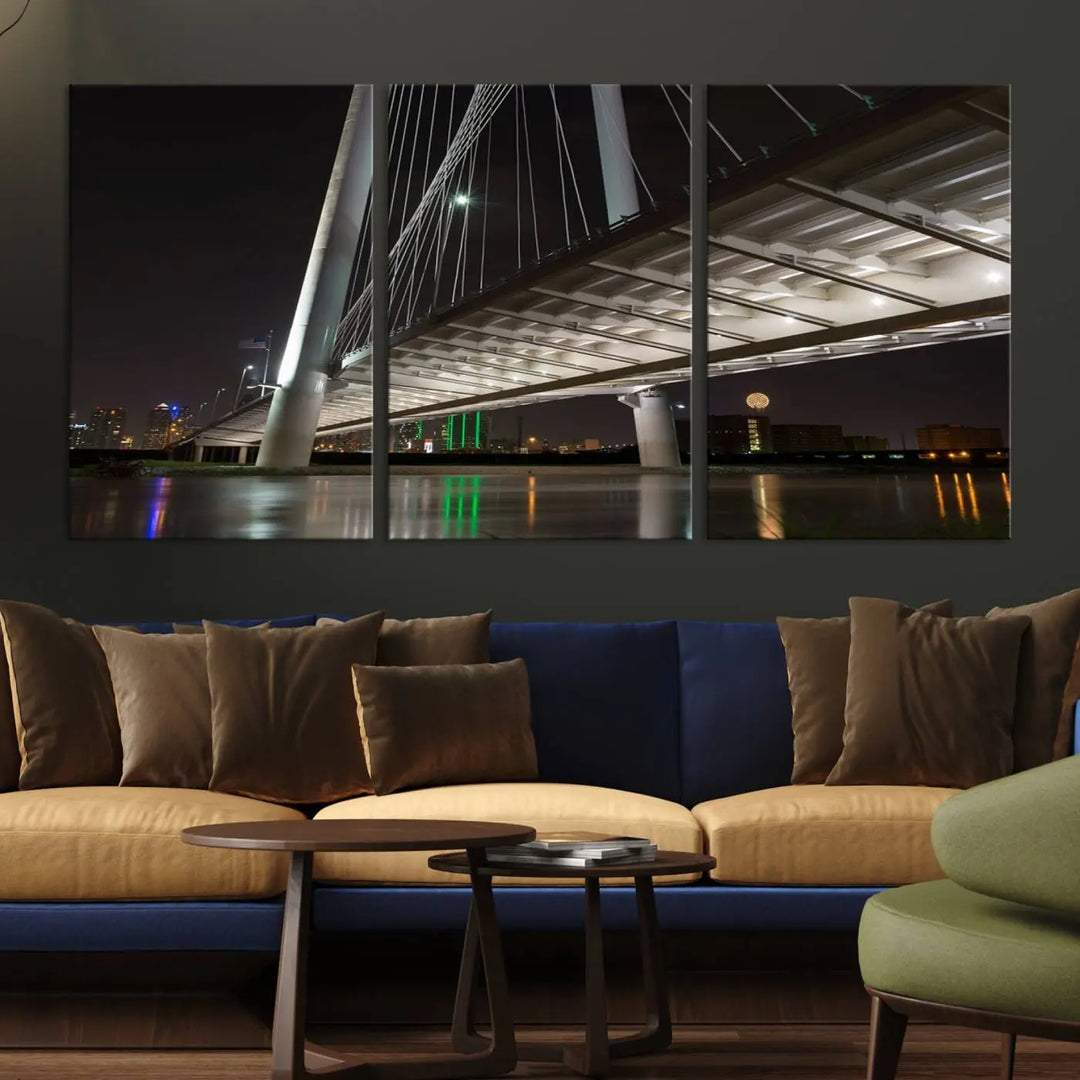 A modern living room showcases the "Dallas City Lights" night skyline cityscape as a triptych on museum-quality canvas. Enjoy the art's longevity with its UV-protective coating, all available with free shipping.