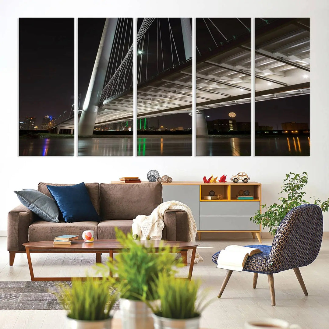 A modern living room showcases the "Dallas City Lights" night skyline cityscape as a triptych on museum-quality canvas. Enjoy the art's longevity with its UV-protective coating, all available with free shipping.