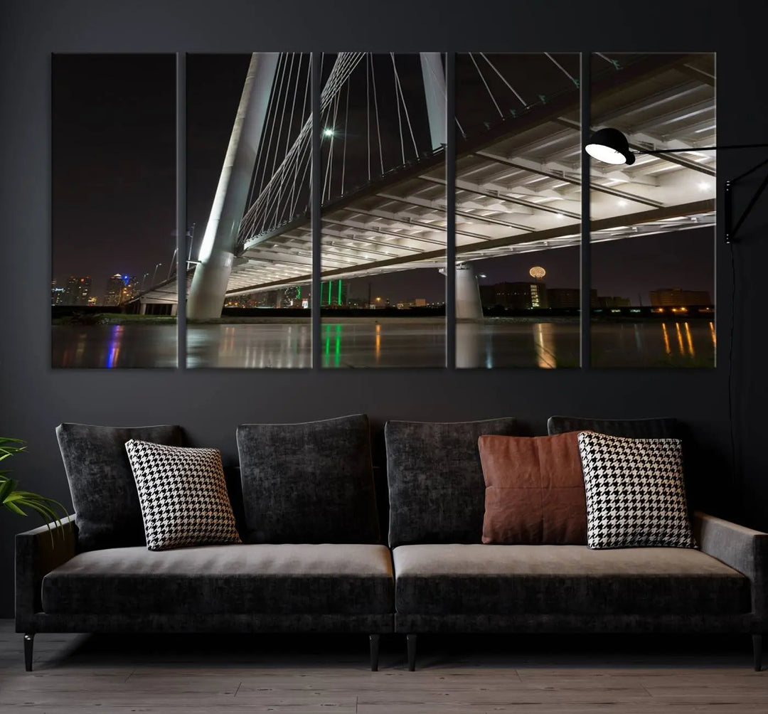 A modern living room showcases the "Dallas City Lights" night skyline cityscape as a triptych on museum-quality canvas. Enjoy the art's longevity with its UV-protective coating, all available with free shipping.