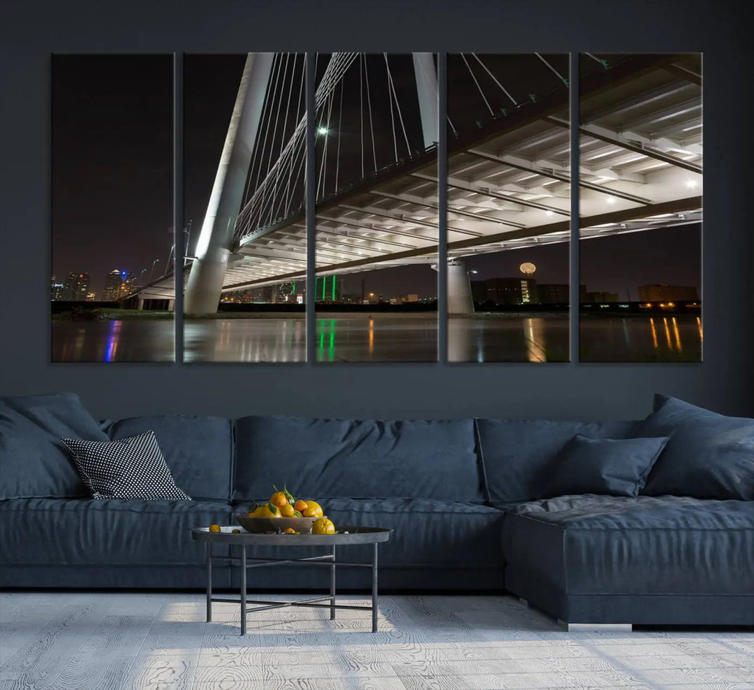 A modern living room showcases the "Dallas City Lights" night skyline cityscape as a triptych on museum-quality canvas. Enjoy the art's longevity with its UV-protective coating, all available with free shipping.