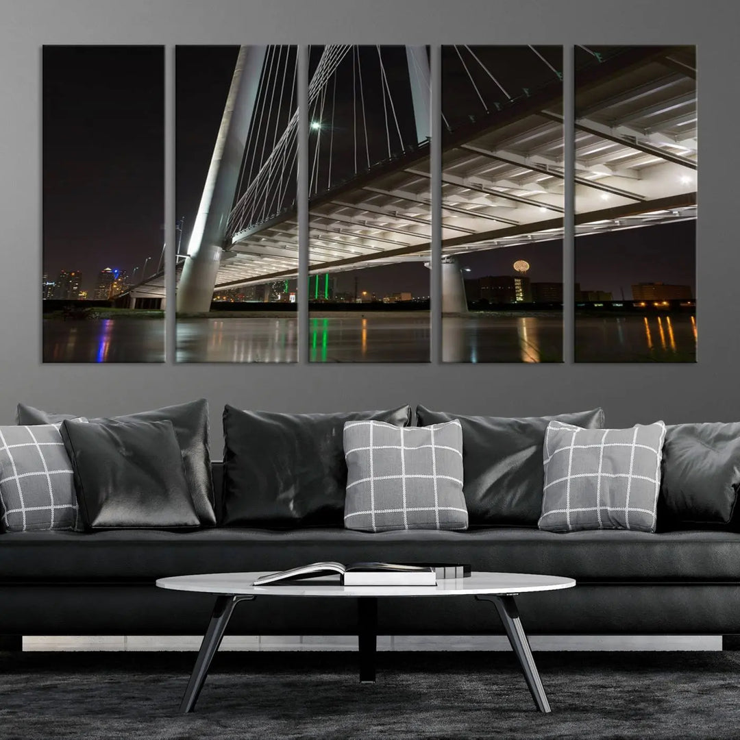 A modern living room showcases the "Dallas City Lights" night skyline cityscape as a triptych on museum-quality canvas. Enjoy the art's longevity with its UV-protective coating, all available with free shipping.