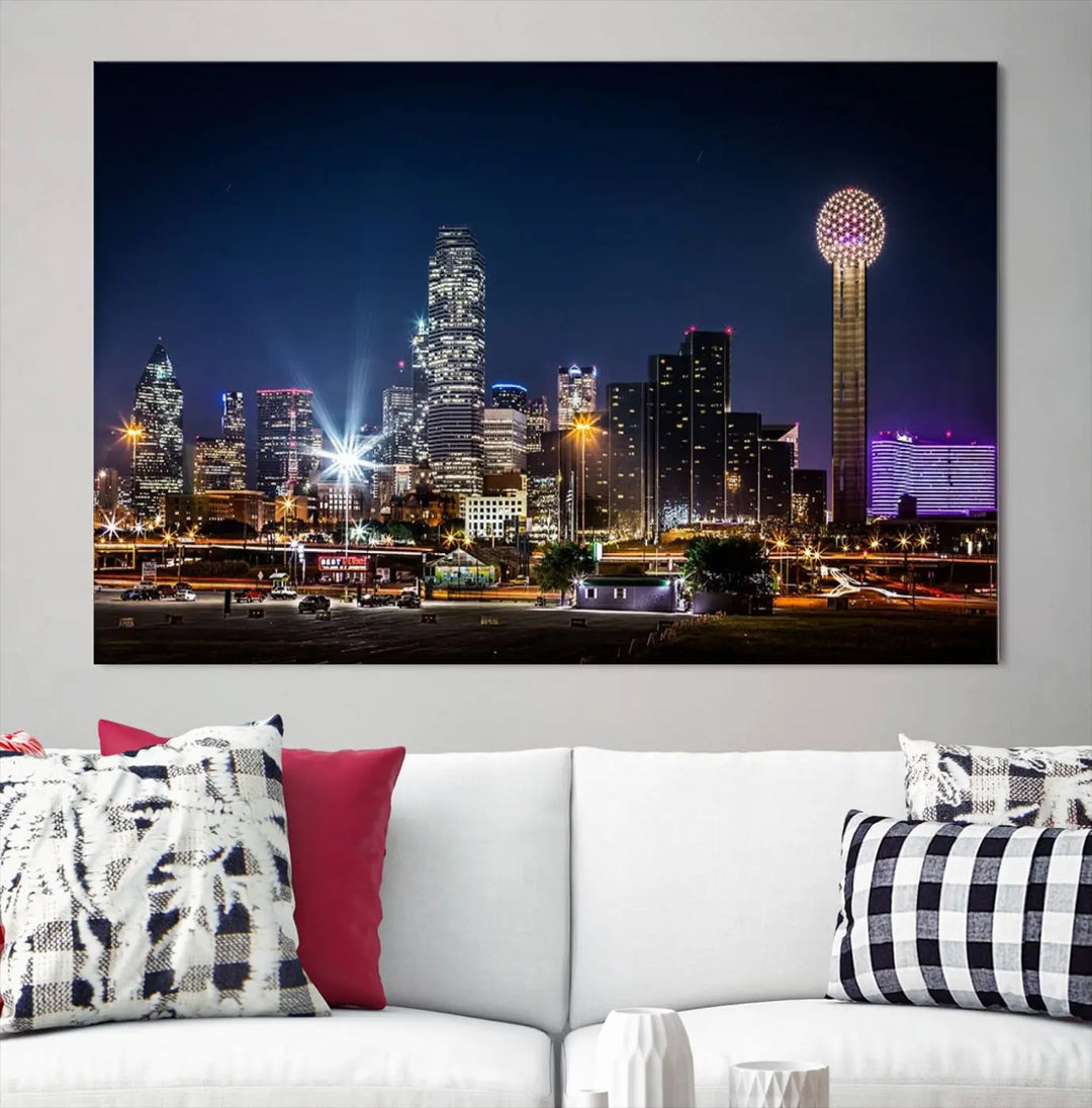 A living room showcases the Dallas City Lights Night Skyline Cityscape View Wall Art Canvas Print, a triptych photo of a city skyline at night on museum-quality canvas that is ready to hang.